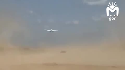 Airplane almost lands on a runway under construction