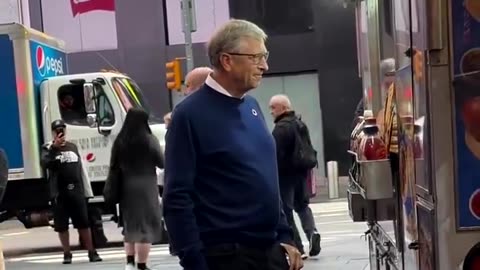 Bill Gates in public trying to look human............. doesnt even eat the hotdog