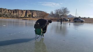 Man Enjoys a Ride in His Wind Drawn Sleigh