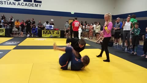 Girl fights boy gi jiu jitsu