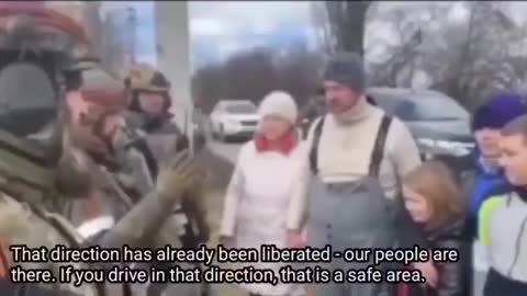 Russian soldiers helping Ukraine people