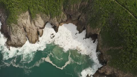 Sea waves in a little bay