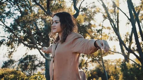 Girl spinning in the park