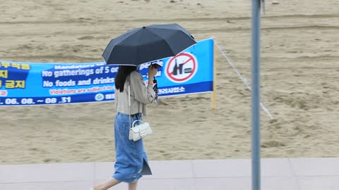 a woman on a rainy day