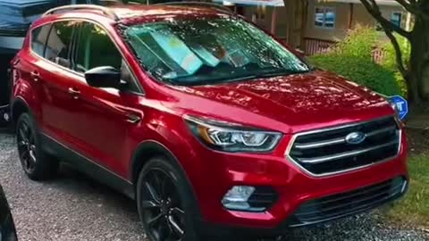 The family's new car and their old car repair.