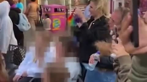 Drag star uses a penis shaped angle grinder to stimulate sex acts in front of children