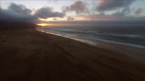 aerial view of cofete beach at sunset in the national park of jandia