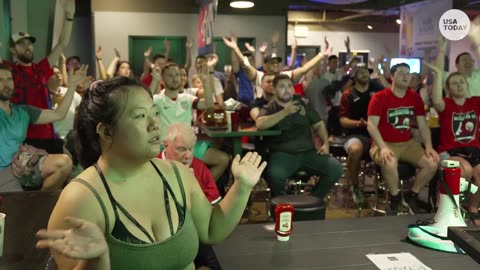 Fans gather in the early morning hours of the US Women's National Team World Cup