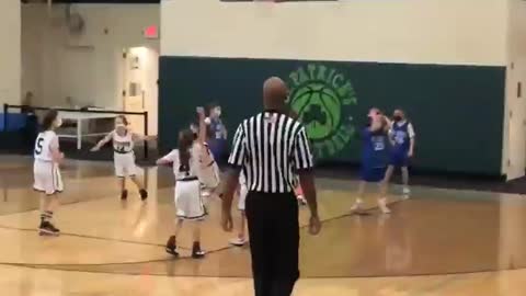 Kids forced to wear masks while playing basketball