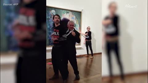 Climate protesters pour black liquid on Klimt masterpiece in Vienna