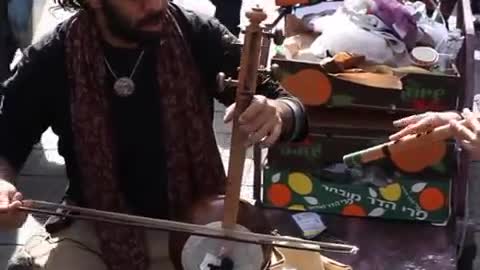 cultures from around the world - Israeli kamancheh player at market, Jerusalem, Israel Episode 2