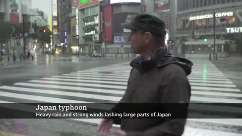 Japan hit by biggest typhoon in decades - BBC News