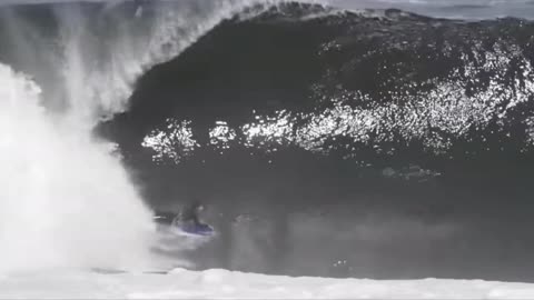 Monster Wave Meet Mastery: Surfer's Epic Ride