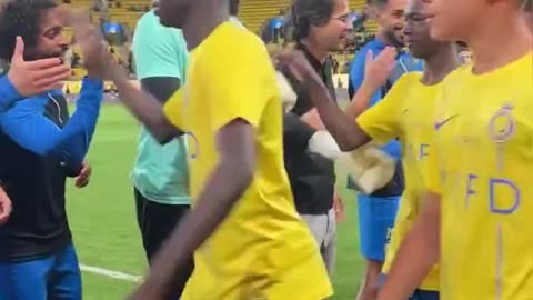 Ronaldo applauded Ronaldo Jr onto the pitch after Al-Nassr U13's were crowned champions