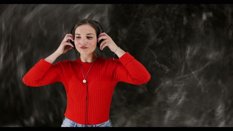 Beautiful girl dancing with a headphone