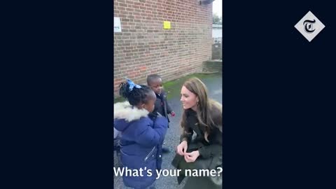 Princess of Wales gives remembrance poppy to young boy during school visit