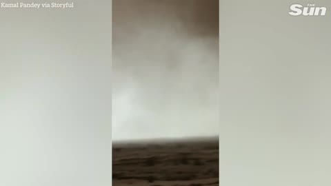 Massive funnel cloud swirls near Doha, Qatar during the World Cup