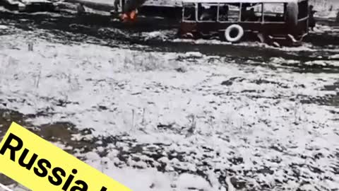 Winter snow and Russian artillery meets Ukrainian convoy and security detail.