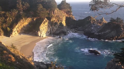 Relaxation Video of a Waterfall on an Ocean Beach at Sunset