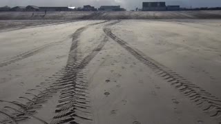 Wind blowing sand all over the beach