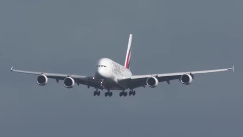 Airbus A380 Emirates landing with strong winds in Düsseldorf in Germany LCM