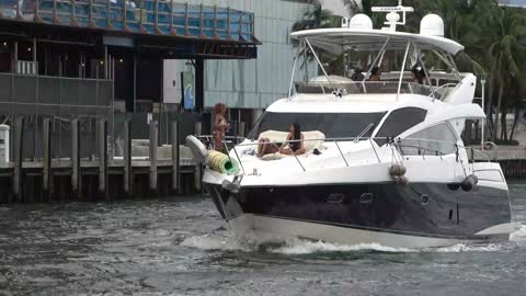 Blonds Brunnets s on Yachts Boats at Miami River came for Fame ! Clif igan Trump Infowars