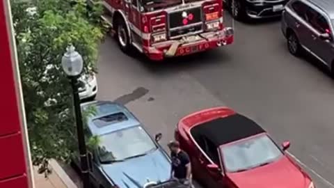 Would you drag? BMW driver blocks firetruck