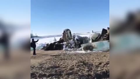 Car-Size Ice Boulders Crash Ashore As Frozen Lake Melts