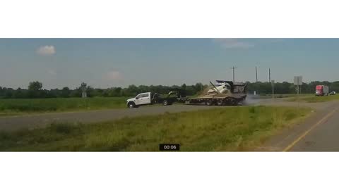 Car Picks the Wrong Time to Turn Across Highway