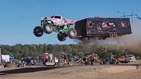 Monster Truck Jumps Towing RV