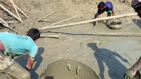 Traditional fishing in Bangladeshi river