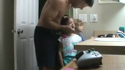 Single Dad pulling Daughters tooth.