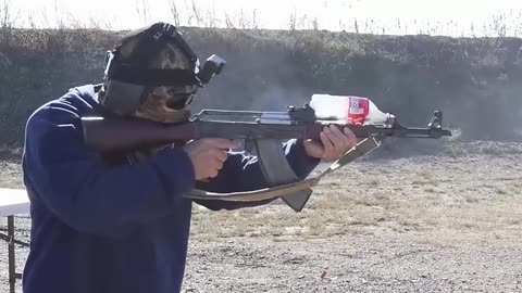 AK 47 fire test with coke bottle