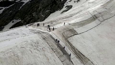 Italian glacier covered up to prevent melting