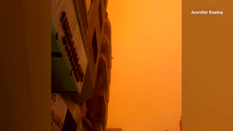 Orange sandstorm blots out sky over Marrakesh