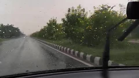 Car Driving in Raining Season