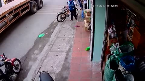 Truck Narrowly Avoids Running Over Kid On Bike