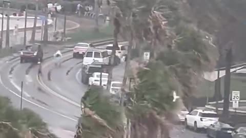 Footage captures waterspout ripping through crowded beach