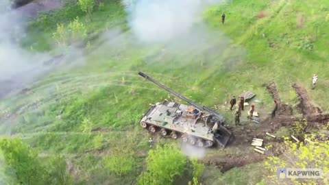 Cossacks of the LPR army shell Ukrainian positions from the Hyacinth self-propelled gun