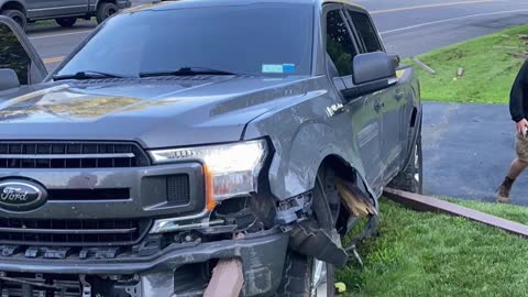 Truck Impaled by Fence Post