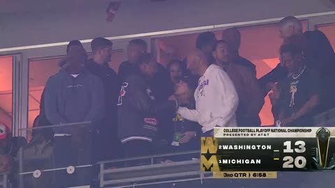 Travis Scott is at the Michigan vs Washington national championship