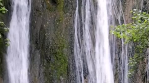 A waterfall hung before my eyes like a silver curtain. What a spectacle!