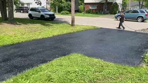 Professional Asphalt Spray Sealing: “Hiding Behind The Chimney One” Top Coats Pavement Maintenance