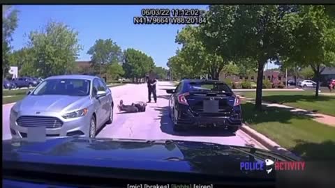 Crazy! Car randomly pulls up next to a cop and a crazy man jumped out and did the craziest thing