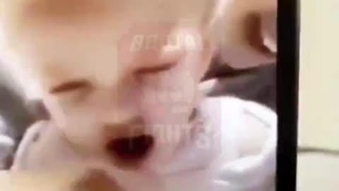 Mom Laughs While Giving Her Baby Alcohol