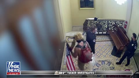 Tucker Carlson | Jan6 video footage shows Capitol Police acting as QAnon Shaman's Tour Guide