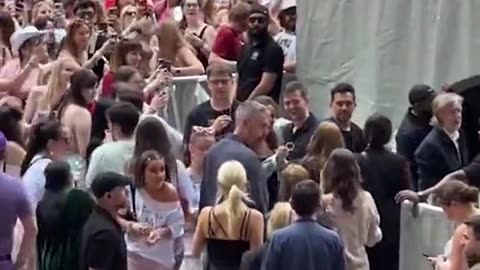 Paul McCartney dances with Taylor Swift fans as he arrives at gig