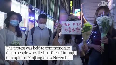 Hong Kong residents show support for mainland China Covid protests