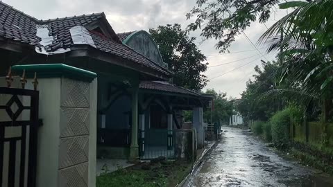 Rain in my village by the river__Rainy atmosphere of Indonesian countryside__Indonesia