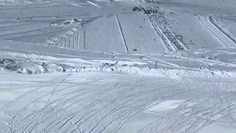 Snowboard triple somersault.